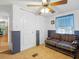 Spacious bedroom with double closets and a couch at 9140 & 9130 Peony St, New Port Richey, FL 34654