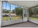 Spacious screened porch overlooking the backyard at 9140 & 9130 Peony St, New Port Richey, FL 34654