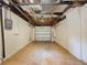 Empty garage with an automatic garage door at 7206 Ashwood Dr, Port Richey, FL 34668