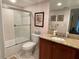 Bathroom with granite vanity and bathtub at 2595 Countryside Blvd # 8205, Clearwater, FL 33761