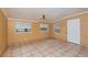 Simple dining room with tile flooring and neutral wall color at 24514 Audubon Dr, Brooksville, FL 34601