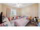 Bright bedroom with a twin-size bed and colorful decor at 10463 Claymore St, Spring Hill, FL 34608