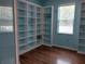 Well-appointed office with built-in shelving, providing storage solutions and design at 11143 Merganser Way, New Port Richey, FL 34654