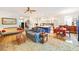 Spacious open floorplan with a living room, kitchen, and dining area filled with natural light at 11143 Merganser Way, New Port Richey, FL 34654