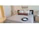 Cozy bedroom with a comfortable bed, stylish nightstands, and soft lighting, providing a relaxing retreat at 3605 Kings Rd # 102, Palm Harbor, FL 34685