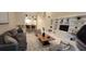 Spacious living room with modern decor, stylish furniture, and plenty of natural light, creating a welcoming atmosphere at 3605 Kings Rd # 102, Palm Harbor, FL 34685