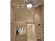 Bright living room features a ceiling fan, recessed lighting, and an open floor plan at 3605 Kings Rd # 102, Palm Harbor, FL 34685