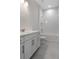 Modern bathroom featuring subway tile and white vanity at 3898 Southern Valley Loop, Brooksville, FL 34601