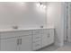 Bathroom featuring a double sink vanity with white cabinets at 3898 Southern Valley Loop, Brooksville, FL 34601