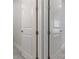 A clean white closet with double doors at 3898 Southern Valley Loop, Brooksville, FL 34601