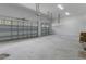 Spacious garage with two-car capacity, automatic doors, and ample room for storage at 3898 Southern Valley Loop, Brooksville, FL 34601