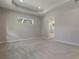 Spacious main bedroom features neutral carpet and an attached bathroom at 3898 Southern Valley Loop, Brooksville, FL 34601