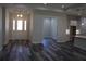 View of entryway with double doors, and open floor plan to kitchen and other living areas at 4676 Hickory Oak Dr, Brooksville, FL 34601
