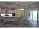 Gourmet kitchen featuring stainless steel appliances, large island, and a seamless flow into the living space at 4676 Hickory Oak Dr, Brooksville, FL 34601