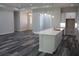 Modern kitchen and spacious living room featuring a stylish kitchen island with pendant lighting at 4676 Hickory Oak Dr, Brooksville, FL 34601