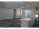 Bright living room featuring plank floors, recessed lighting, and a modern kitchen island at 4676 Hickory Oak Dr, Brooksville, FL 34601