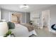Bright main bedroom with neutral decor and sliding door access to the patio at 7332 Mako Dr, Hudson, FL 34667