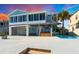 House with pool and hot tub, steps leading to the water at 7637 Hatteras Dr, Hudson, FL 34667