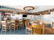 Well-equipped basement bar with seating for guests at 7637 Hatteras Dr, Hudson, FL 34667