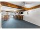 Spacious basement recreation area featuring a bar and seating at 7637 Hatteras Dr, Hudson, FL 34667
