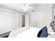 Bedroom with double closets and access to a shared bathroom at 7637 Hatteras Dr, Hudson, FL 34667