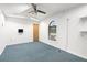 Versatile bonus room with window, ceiling fan, and plenty of space at 7637 Hatteras Dr, Hudson, FL 34667