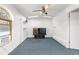 Bright bonus room with ceiling fan and carpet at 7637 Hatteras Dr, Hudson, FL 34667