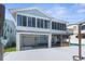 Elevated home with garage, pool, and hot tub at 7637 Hatteras Dr, Hudson, FL 34667