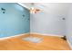 Large living room with hardwood floors and ceiling fan at 7637 Hatteras Dr, Hudson, FL 34667
