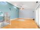 Open living room with hardwood floors and high ceilings at 7637 Hatteras Dr, Hudson, FL 34667