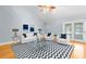 Open living room with vaulted ceilings and wood floors at 7637 Hatteras Dr, Hudson, FL 34667