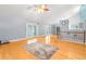 Open living room with hardwood floors and high ceilings at 7637 Hatteras Dr, Hudson, FL 34667