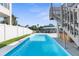 Inviting heated pool with concrete decking at 7637 Hatteras Dr, Hudson, FL 34667
