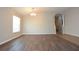 Dining room with hardwood floors and a view to another room at 11531 Weston Course Loop, Riverview, FL 33579