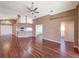 Open kitchen with granite countertop and breakfast bar at 13626 Bryndlewood Ct, Hudson, FL 34669
