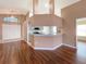 Modern kitchen with granite countertop and breakfast bar at 13626 Bryndlewood Ct, Hudson, FL 34669