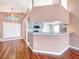 Updated kitchen with gray cabinets and granite countertops at 13626 Bryndlewood Ct, Hudson, FL 34669