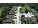 Aerial view of a residential neighborhood with houses and landscaping at 13626 Bryndlewood Ct, Hudson, FL 34669