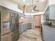 Modern kitchen with stainless steel appliances and granite countertops at 13626 Bryndlewood Ct, Hudson, FL 34669