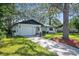 Single story house with driveway and landscaping at 2004 Nobleton Ave, Spring Hill, FL 34608