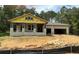 New construction home with block exterior and attached garage at 3898 Southern Valley Loop, Brooksville, FL 34601