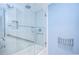 Modern bathroom with a walk-in shower and glass enclosure at 3605 Kings Rd # 102, Palm Harbor, FL 34685