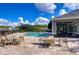 Relaxing community pool with seating areas at 3605 Kings Rd # 102, Palm Harbor, FL 34685