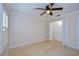 Spacious bedroom with hardwood floors and built-in closet at 3605 Kings Rd # 102, Palm Harbor, FL 34685