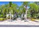 Community clubhouse with a welcoming entrance at 3605 Kings Rd # 102, Palm Harbor, FL 34685