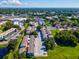 Aerial view showing building's location in the community at 1127 King Arthur Ct # 305, Dunedin, FL 34698