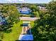Community shuffleboard courts under covered areas at 1127 King Arthur Ct # 305, Dunedin, FL 34698