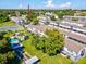 Aerial view of building and surrounding community features at 1127 King Arthur Ct # 305, Dunedin, FL 34698