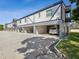 Building with covered parking spaces for residents at 1127 King Arthur Ct # 305, Dunedin, FL 34698