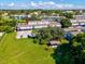 Aerial view showing building location and amenities at 1127 King Arthur Ct # 305, Dunedin, FL 34698